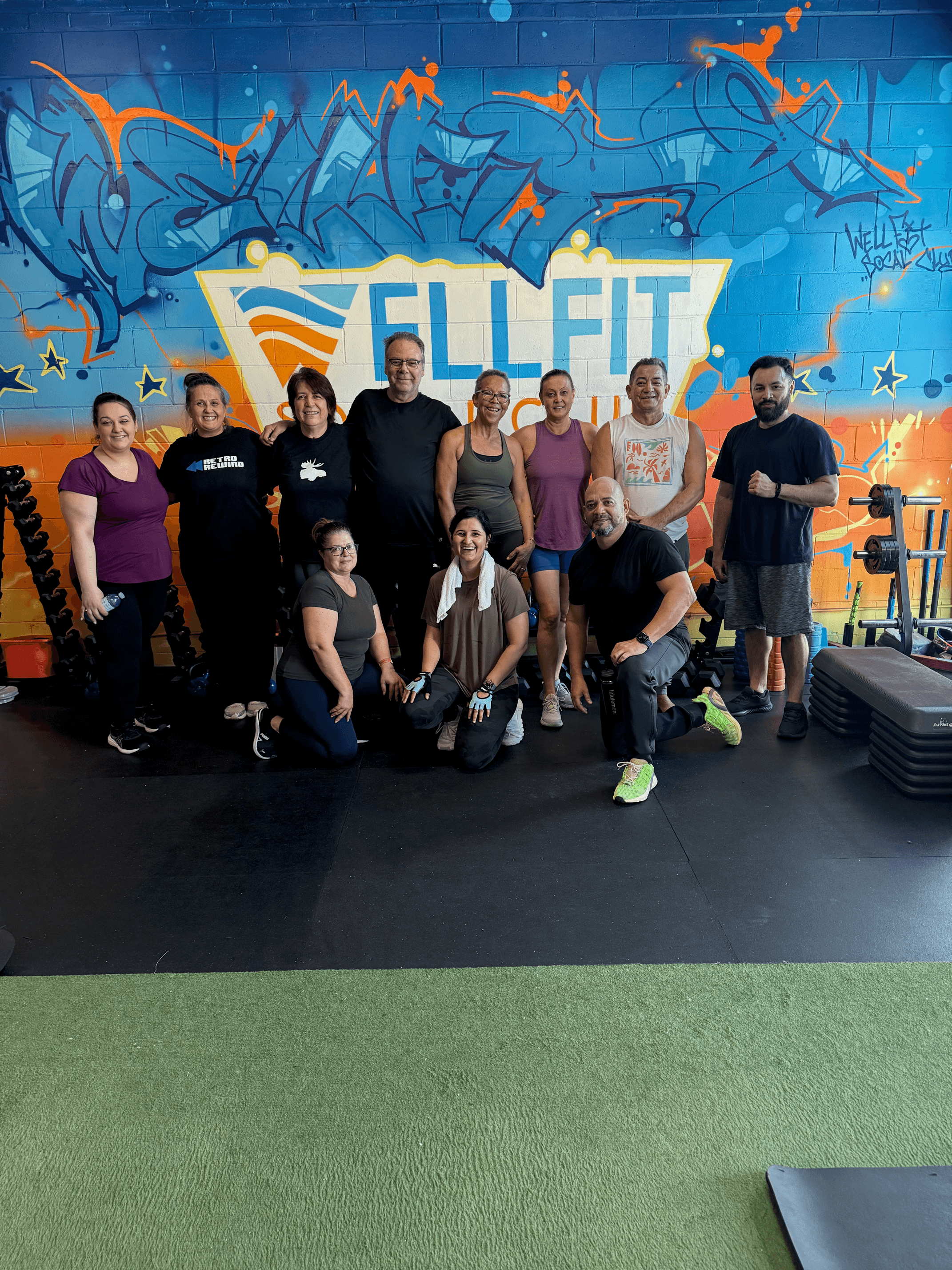 Wellfit Social Club members in a small-group HIIT class